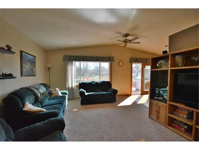 Bright and inviting open and vaulted living room w