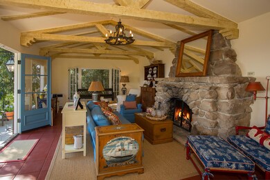 15 Loma Media LR Stone Fireplace