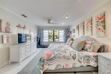Primary bedroom w/ lake view