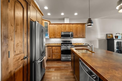 Rich wood cabinets and cabinets with under cabinet lighting