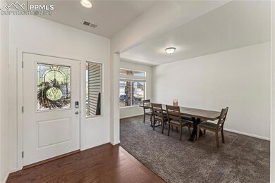 Foyer with visible vents, recessed lighting, baseb