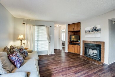 Looking towards bedroom 1. Nice storage unit & woo