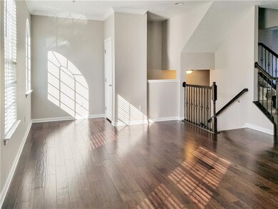 23 x 14 living room  has metal baluster stair case