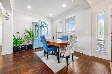 Dining room with plenty of natural light, crown m