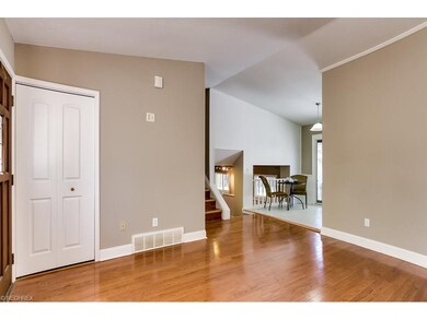 Living room flows to the kitchen and the bedrooms.