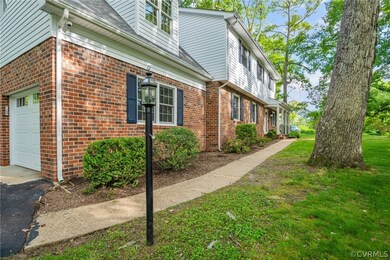aggregate wallk way and double width 2 car garage.
