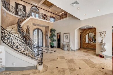 Vaulted ceilings, iron staircase and travertine fl