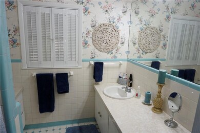 Owners' bath. There is a step in shower and new so