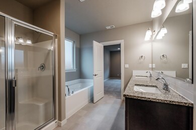 Orchard - Main Bathroom Brown Cabinets