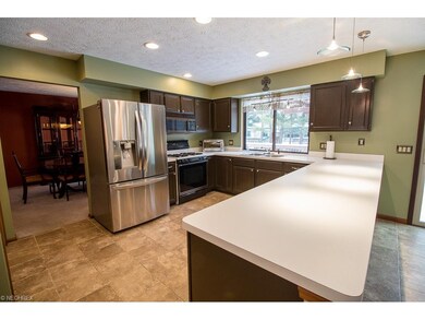 Large kitchen with updated ceramic tile flooring, 