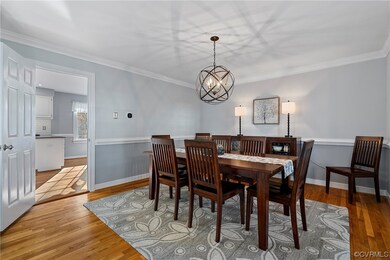 Spacious Dining area featuring wood flooring, an i