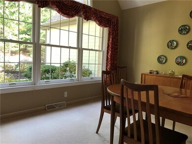another view of dining room, with neutral wall to 