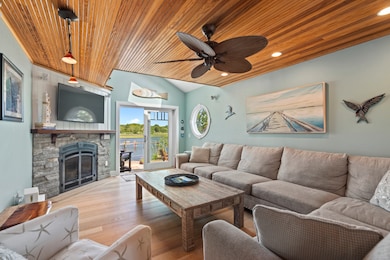 Living Room with Propane Insert Fireplace.