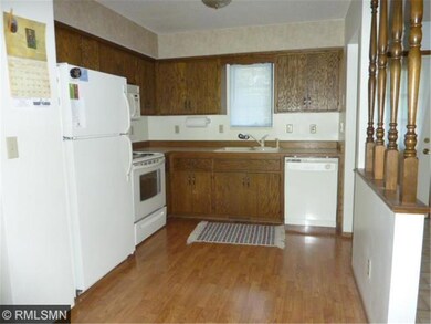 Another view of Kitchen area. Newer wood laminate 