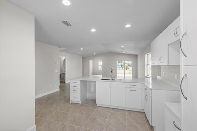 12 SE Los Gatos Ln, Port St. Lucie, FL 34952 - photo 4