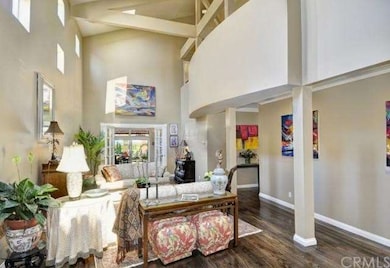 Living Room looking toward Family Room & backyard 