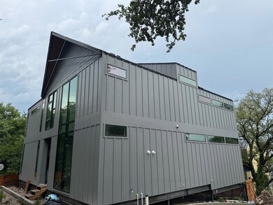 View of side of home featuring board and batten s