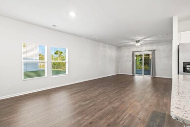 Unfurnished room featuring dark hardwood / wood-st