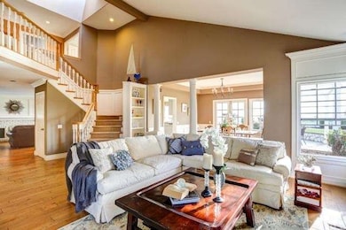 Cathedral-vaulted ceilings in living room with lar