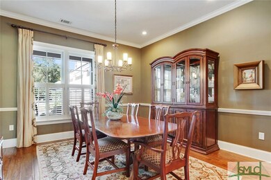The dining room has an organic color palette that 