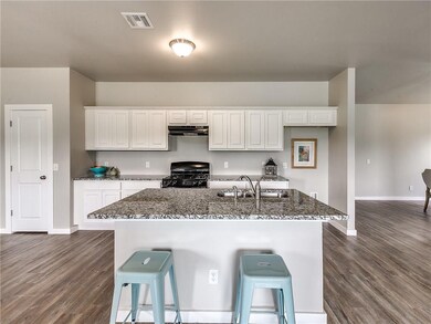 Kitchen - A large center island, pantry, wood-styl
