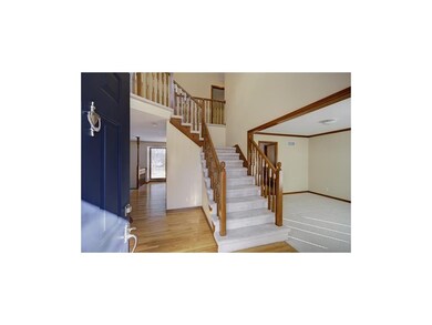 Hardwoods set the stage for a welcoming entry.