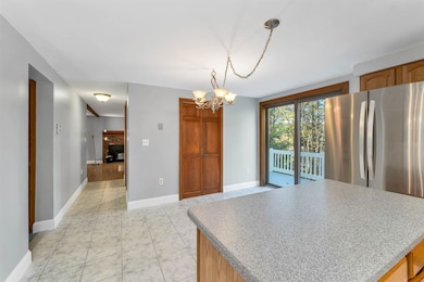 Kitchen opens into living space