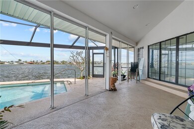 View of pool with a water view