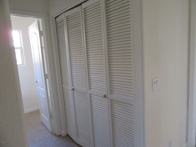 Laundry area behind doors