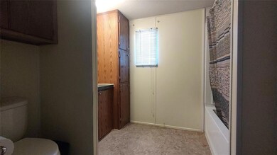 Full bathroom with vanity, shower / bath combinati