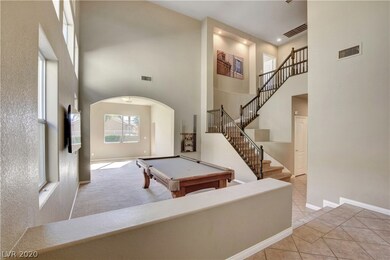 Enter through the front doors to the living room w