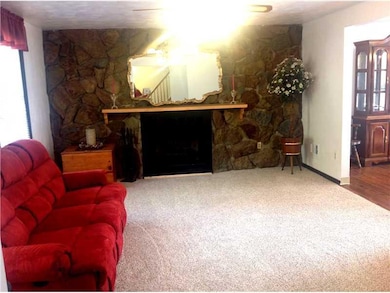 Family Room. New carpet an upgraded padding.