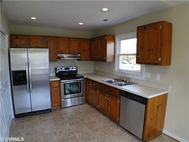 Kitchen - Kitchen with new vinyl flooring, new Whi