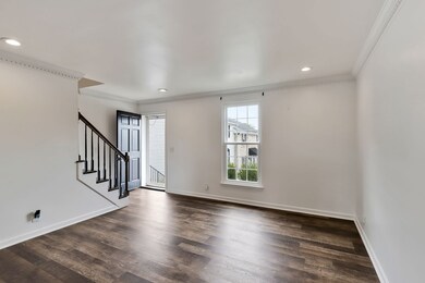 Renovated livingroom New can lights windows, paint and flooring