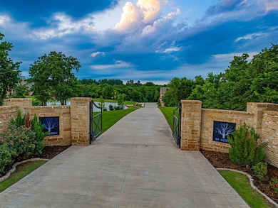 View of gate featuring a lawn