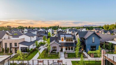 Aerial view at dusk of a residential view and a mountain view