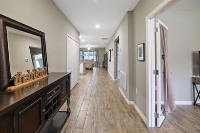 Foyer leading into open concept design