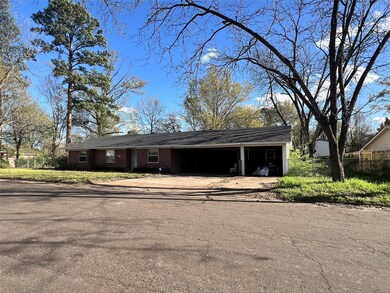 View of front of property featuring brick siding, 