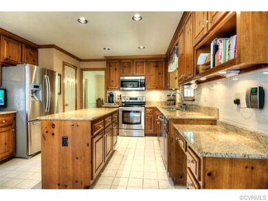 Expansive kitchen with abundant cabinetry, stainle
