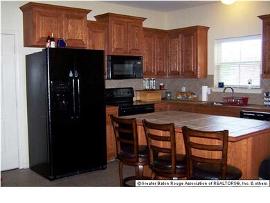 Lots of Cabinets Matching Island