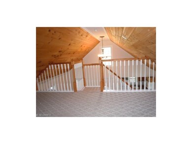 loft/bedroom/office with recessed lighting
