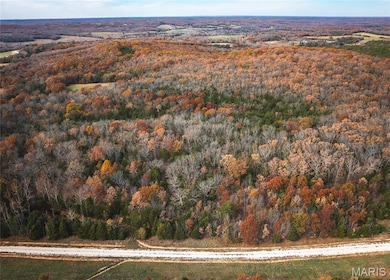 Aerial view of property and surrounding area