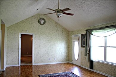 Living room has vaulted ceiling!
