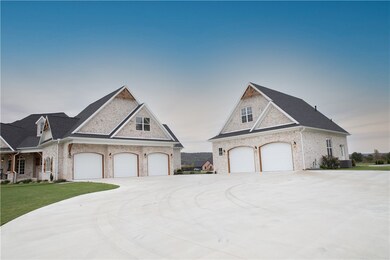 The house has a 3-car garage, and the detached garage/shop will accommodate multiple vehicles.