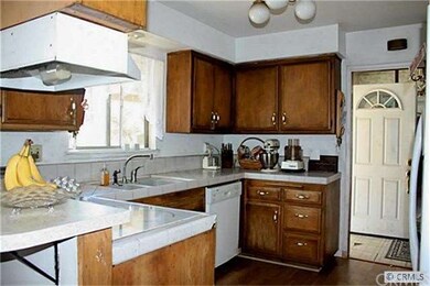 View of kitchen towards front door