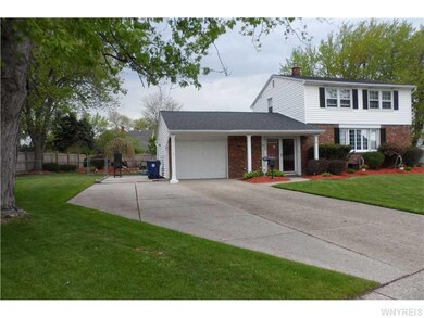 Exterior Front. Extra wide driveway