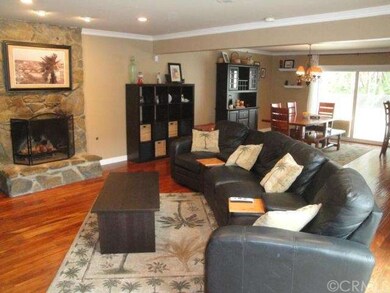 Large living room with fireplace.