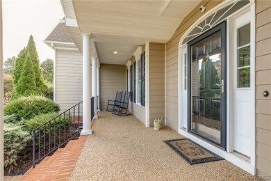 Lovely aggregate front porch to keep those package