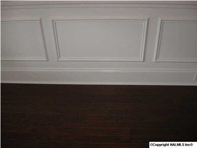 Dining room with chair rail and beauti boxes below.
