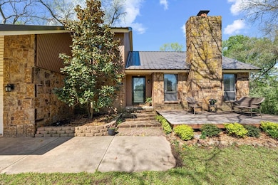 Mid-century modern home featuring a wooden deck, s